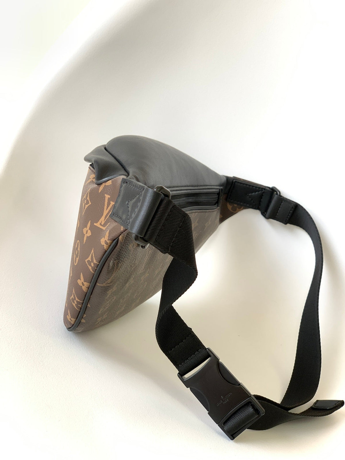 LOUIS VUITTON LV 25S DISCOVERY BUMBAG 47 IN BROWN AND BLACK EMBOSSED MONOGRAM ECLIPSE CALFSKIN