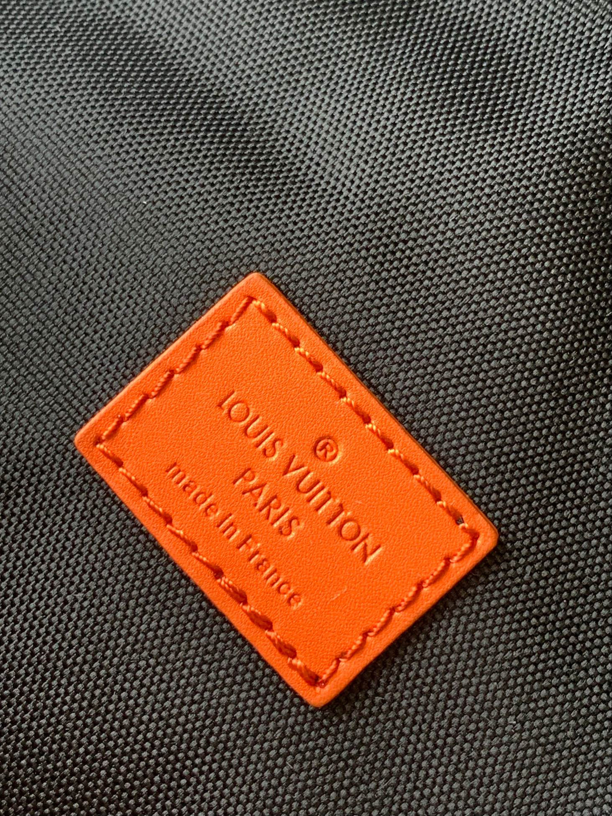 LOUIS VUITTON LV 25S BUMBAG 37 IN BLACK AND ORANGE COATED MONOGRAM CALFSKIN