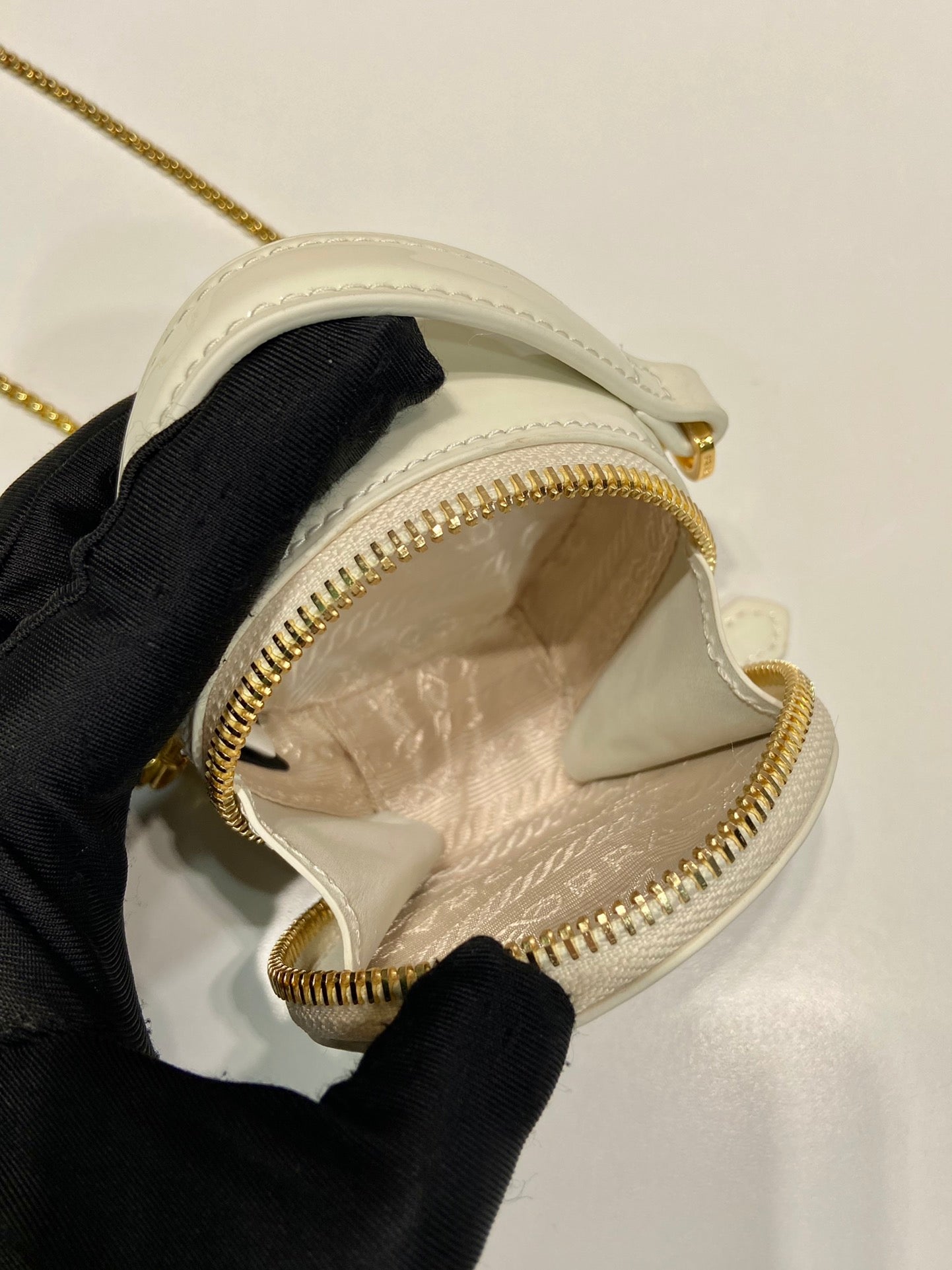 PRADA MINI ROUND BAG 8 IN WHITE GLOSSY CALFSKIN GOLD HARDWARE