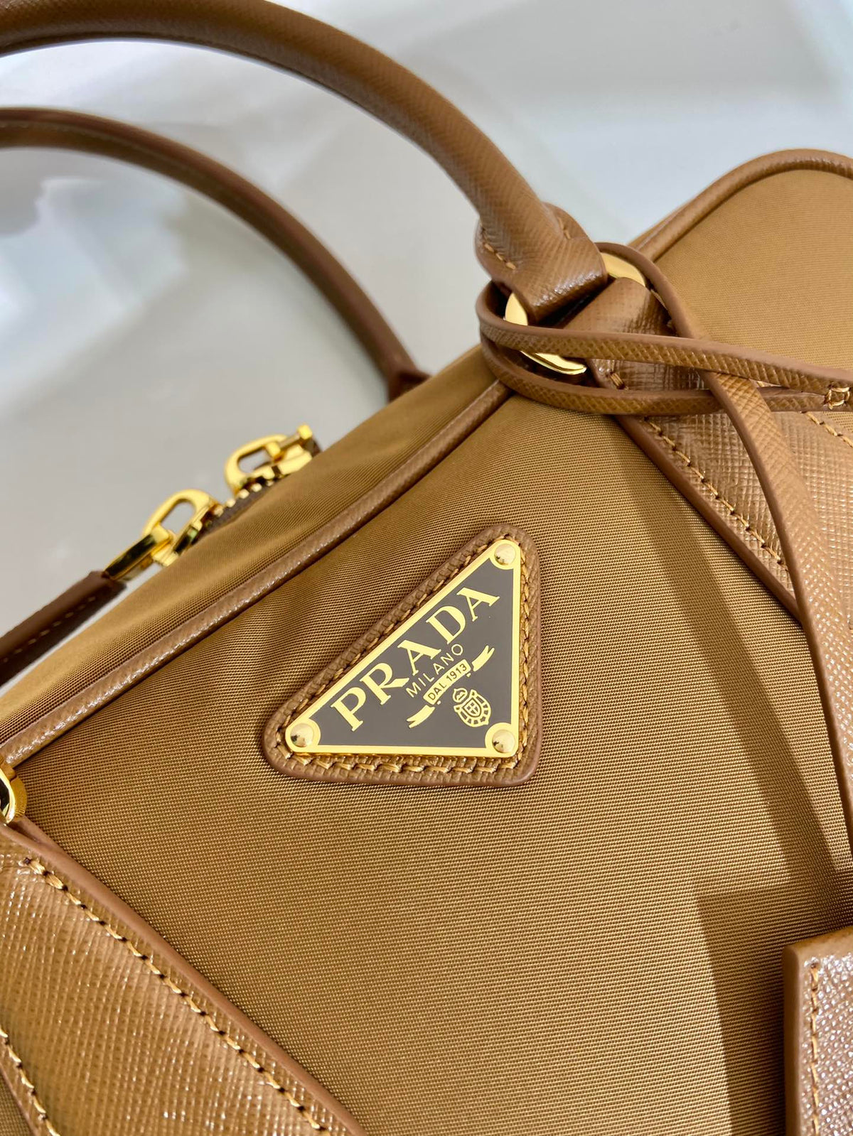 PRADA SMALL TOP HANDLE BAG 25 IN GOLDEN BROWN NYLON AND CALFSKIN TRIM