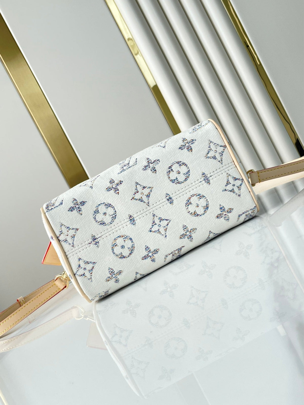 LOUIS VUITTON SPEEDY BANDOULIÈRE 20 IN WHITE MONOGRAM JACQUARD FABRIC AND BEIGE CALFSKIN TRIM