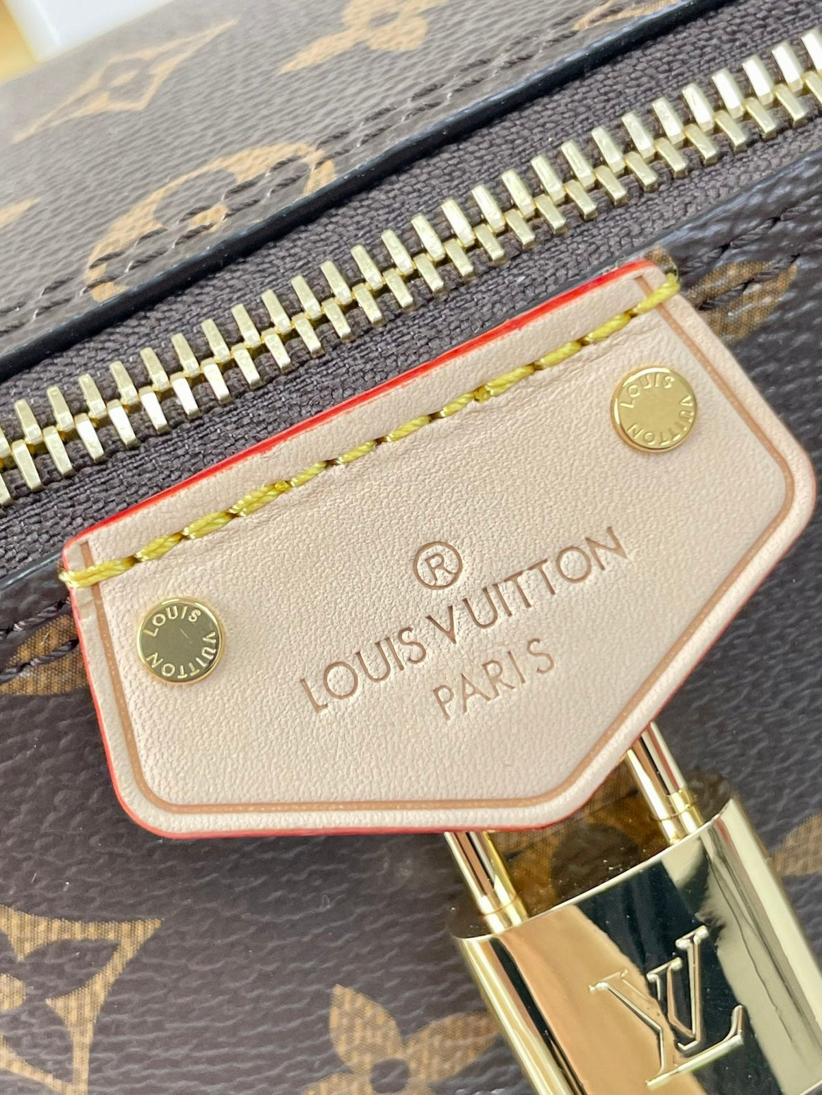 LOUIS VUITTON JUST IN CASE 14 IN BROWN MONOGRAM CANVAS GOLD HARDWARE