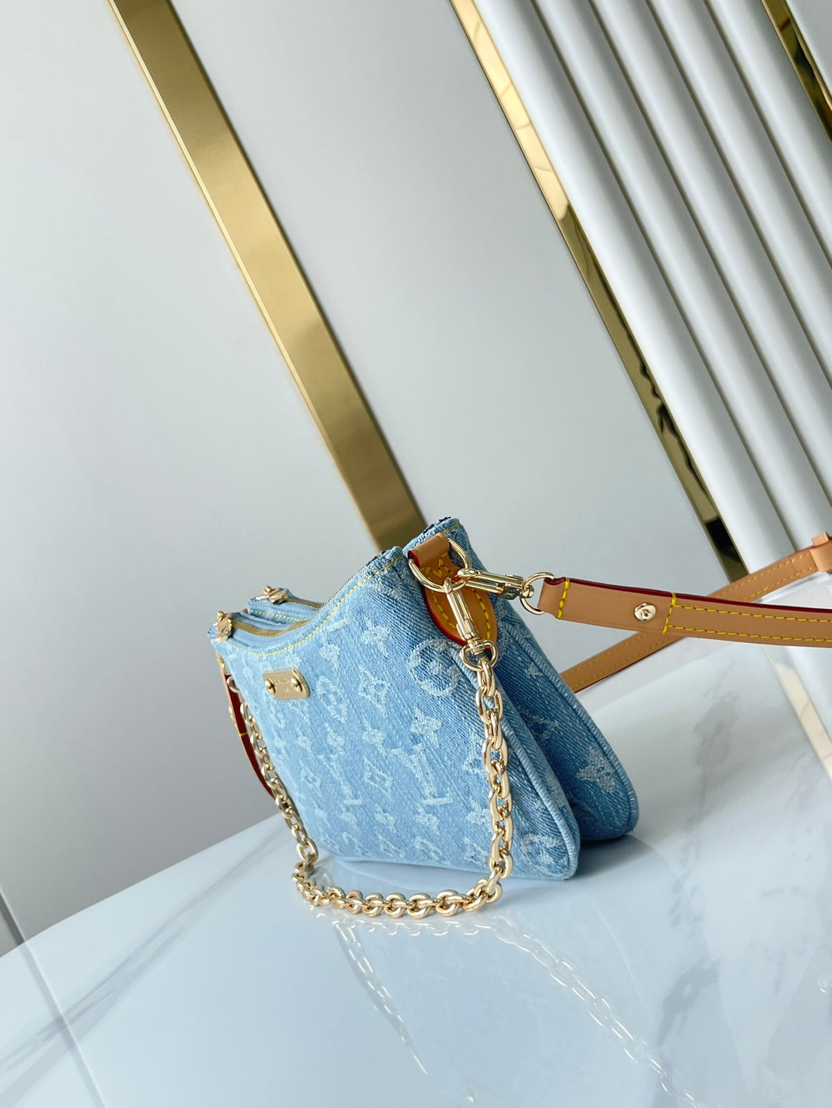 LOUIS VUITTON LIV POCHETTE 24 IN BLUE MONOGRAM DENIM GOLD HARDWARE