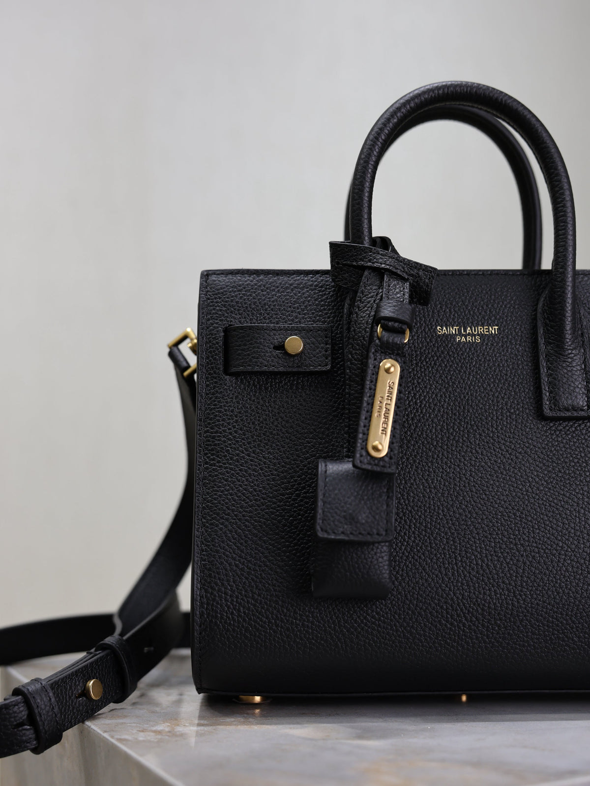 YSL 25S SAC DE JOUR 22 IN BLACK SUPPLE GRAINED CALFSKIN GOLD HARDWARE