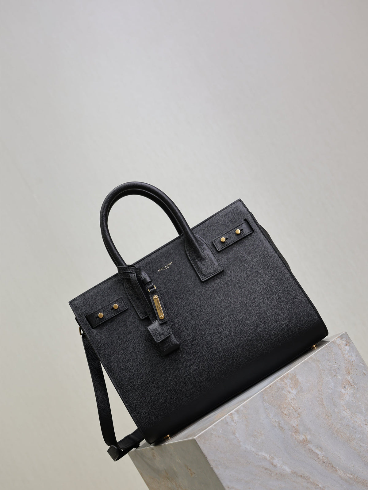 YSL 25S SAC DE JOUR GM 32 IN BLACK SUPPLE GRAINED CALFSKIN GOLD HARDWARE